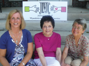 Gina McCord, Ellen McCarthy and Gail Anderson reminisce on the steps at the Junior League of Wyandotte and Johnson Counties