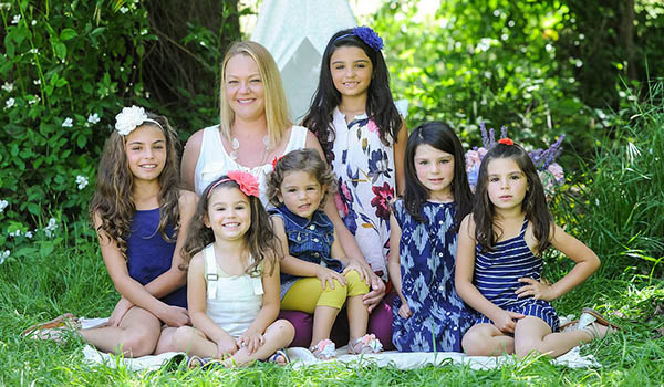 Single mom adopts 6 sisters from foster care