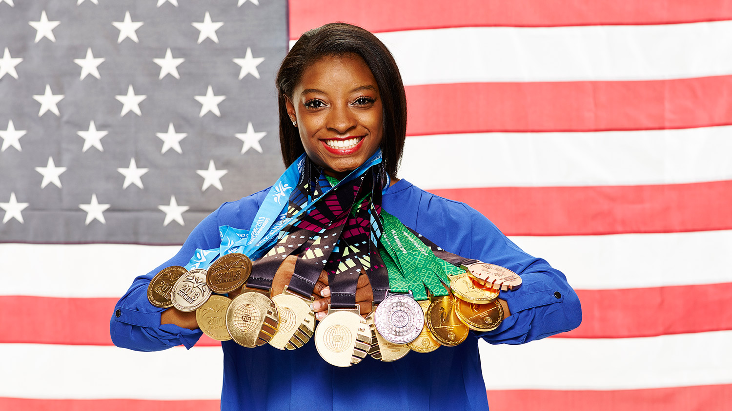 Simone Biles with gold medals