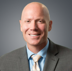 Headshot for Thomas Bailey of KVC Health Systems