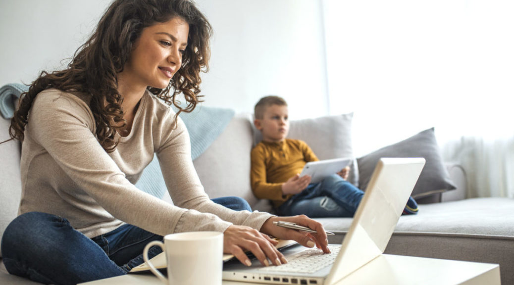 Mother working remotely during coronavirus