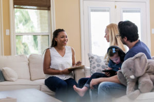 social worker with family