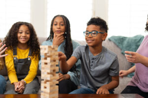 pre teens playing a game