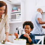 Young family making a nutritious meal. 